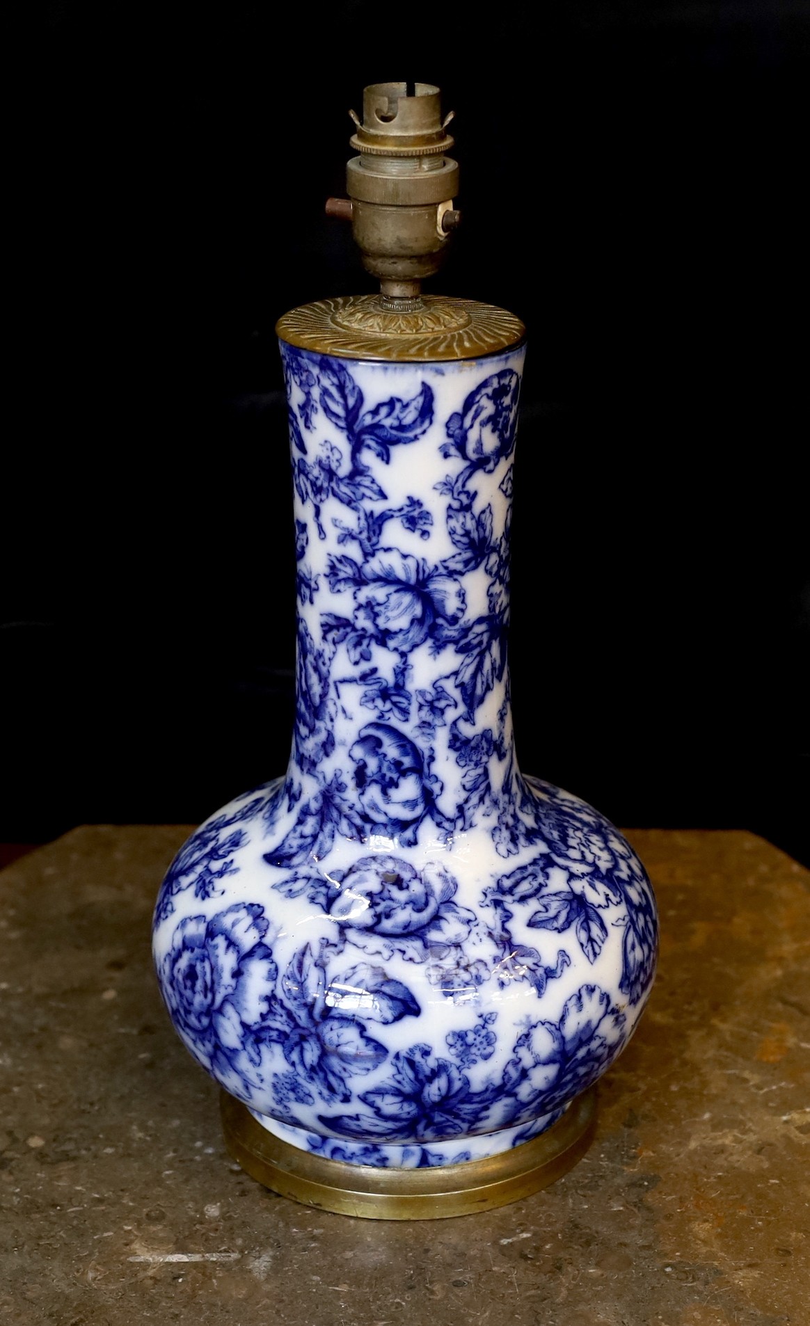 A Victorian mounted blue and white ceramic lamp base, height 38cm